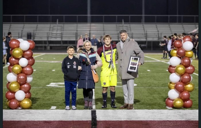 Helgi and his family at a soccer game 